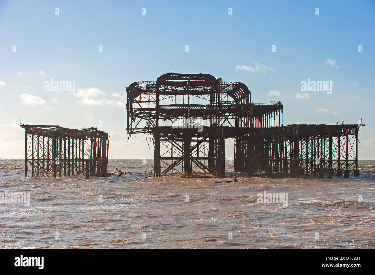 High winds and storms battered Brighton's West Pier causing another big chunk to fall from the already precarious structure Stock Photo