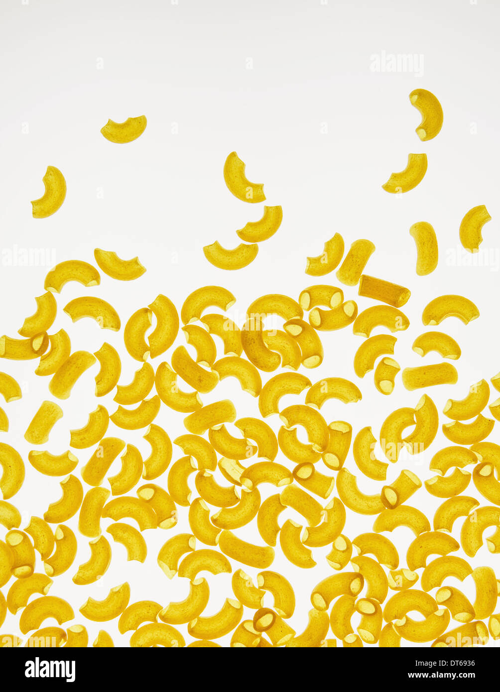 Organic quinoa macaroni pasta elbows, white background (pasta is gluten free) Stock Photo
