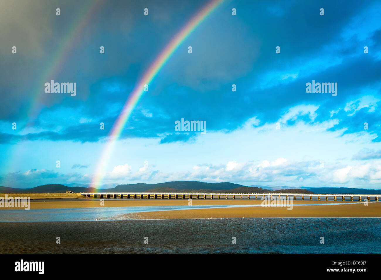 Rainbow over bay at Arnside, Morecambe Bay, Lake District Stock Photo
