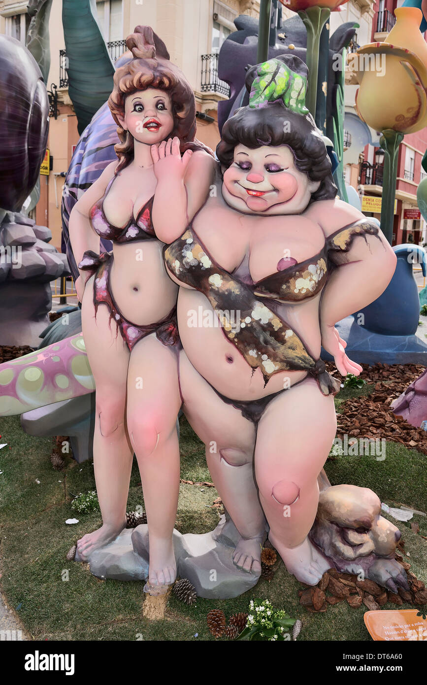 Spain, Valencia Province, Valencia, Two female Papier Mache figures in the street during Las Fallas festival. Stock Photo