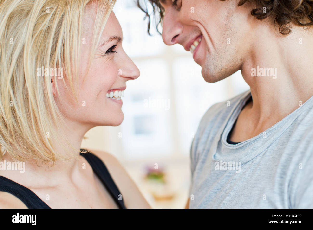 Cropped studio shot of smiling couple Stock Photo