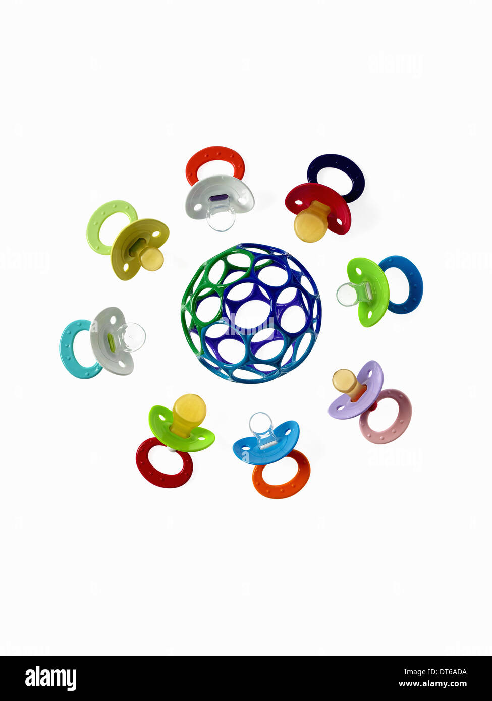 Coloured plastic baby pacifiers, dummies or soothers. Stock Photo