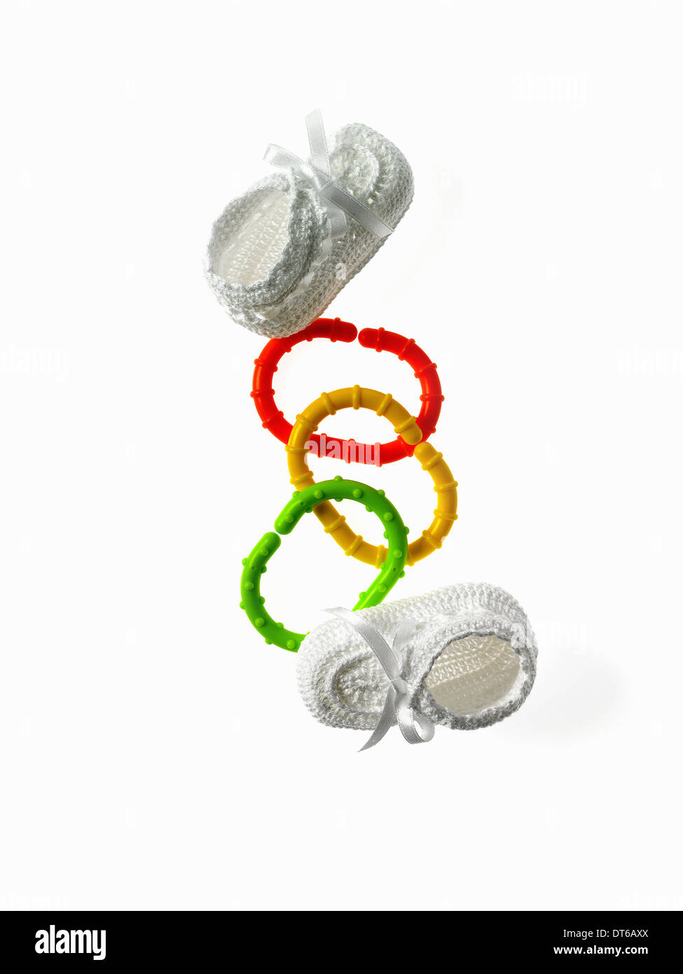 Baby Booties and Teething Toys Stock Photo - Alamy