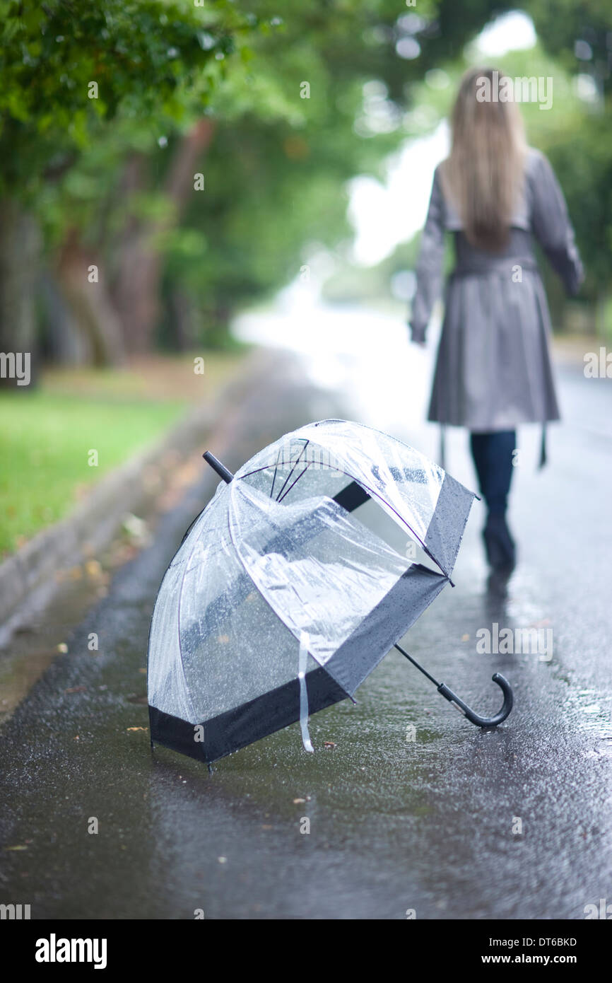 Broken umbrella woman hires stock photography and images Alamy