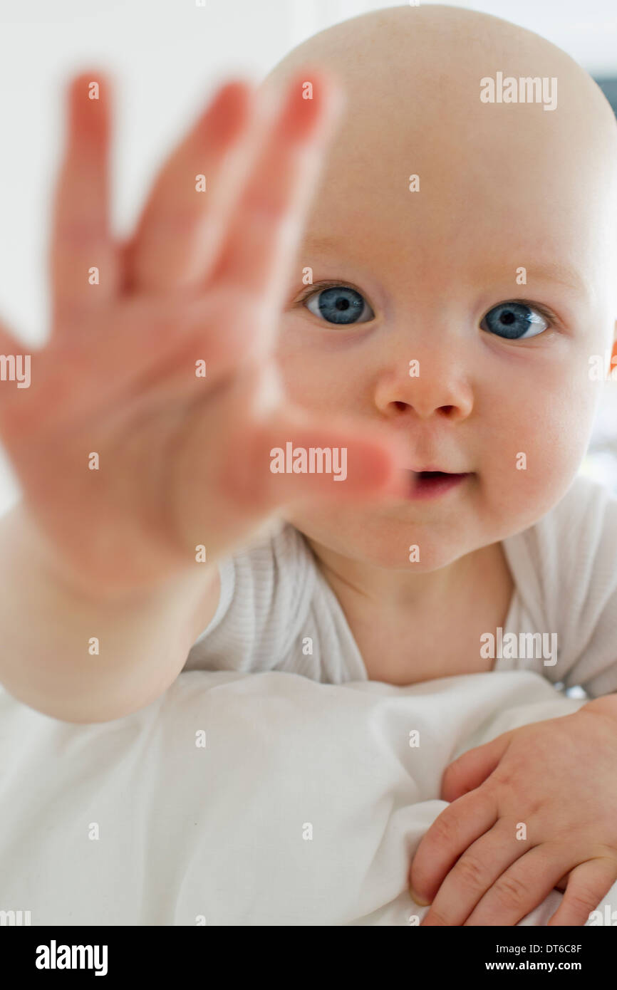 Baby reaching up hi-res stock photography and images - Alamy