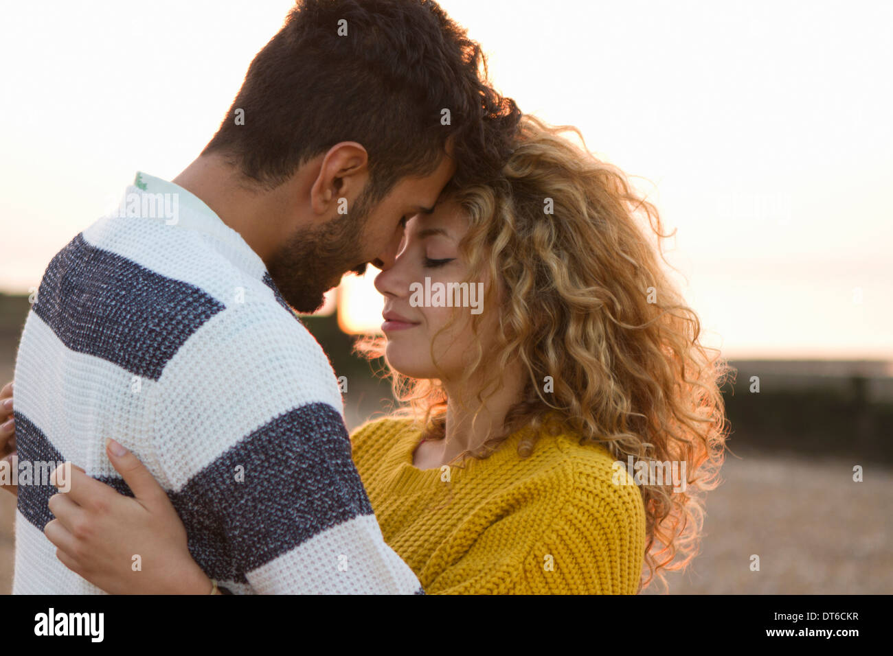 Close up young couple hugging hi-res stock photography and images - Alamy