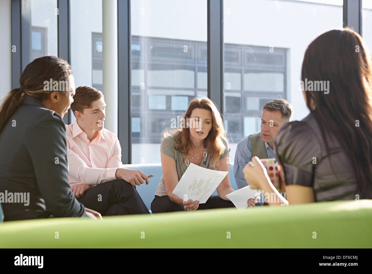 Portrait of business colleagues in meeting Stock Photo