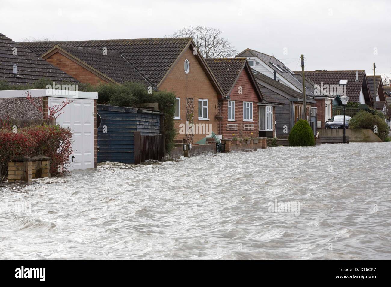 Shepperton, Greater London, UK. 9th Feb, 2014.  House sit with river water at thier doorways on the flodded streets in the town of Shepperton, located in the borough of Spelthorne, Greater London. Credit:  Jeff Gilbert/Alamy Live News Stock Photo
