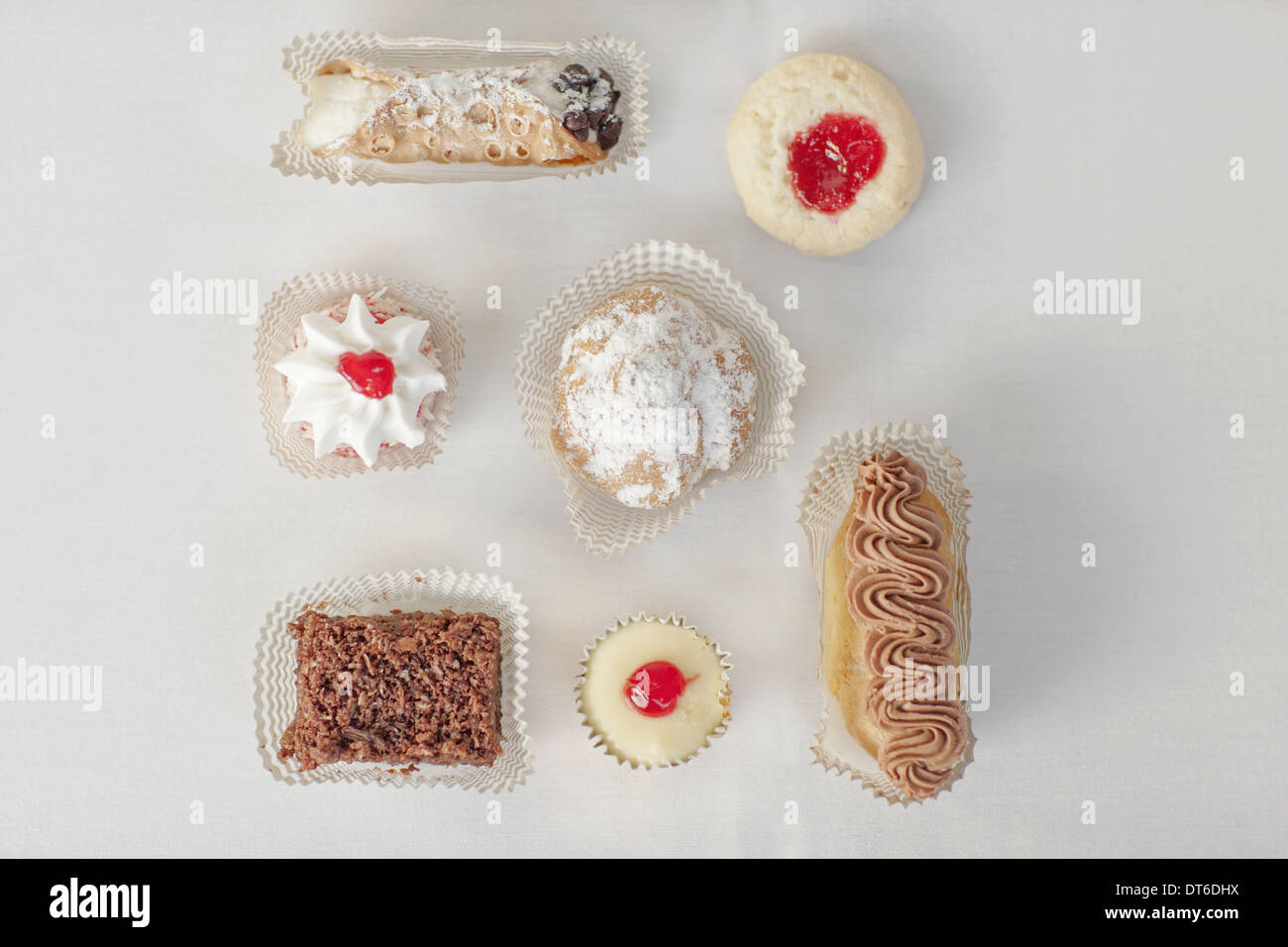 A selection of party desserts, organic food, and dainty cakes and pastries. Stock Photo