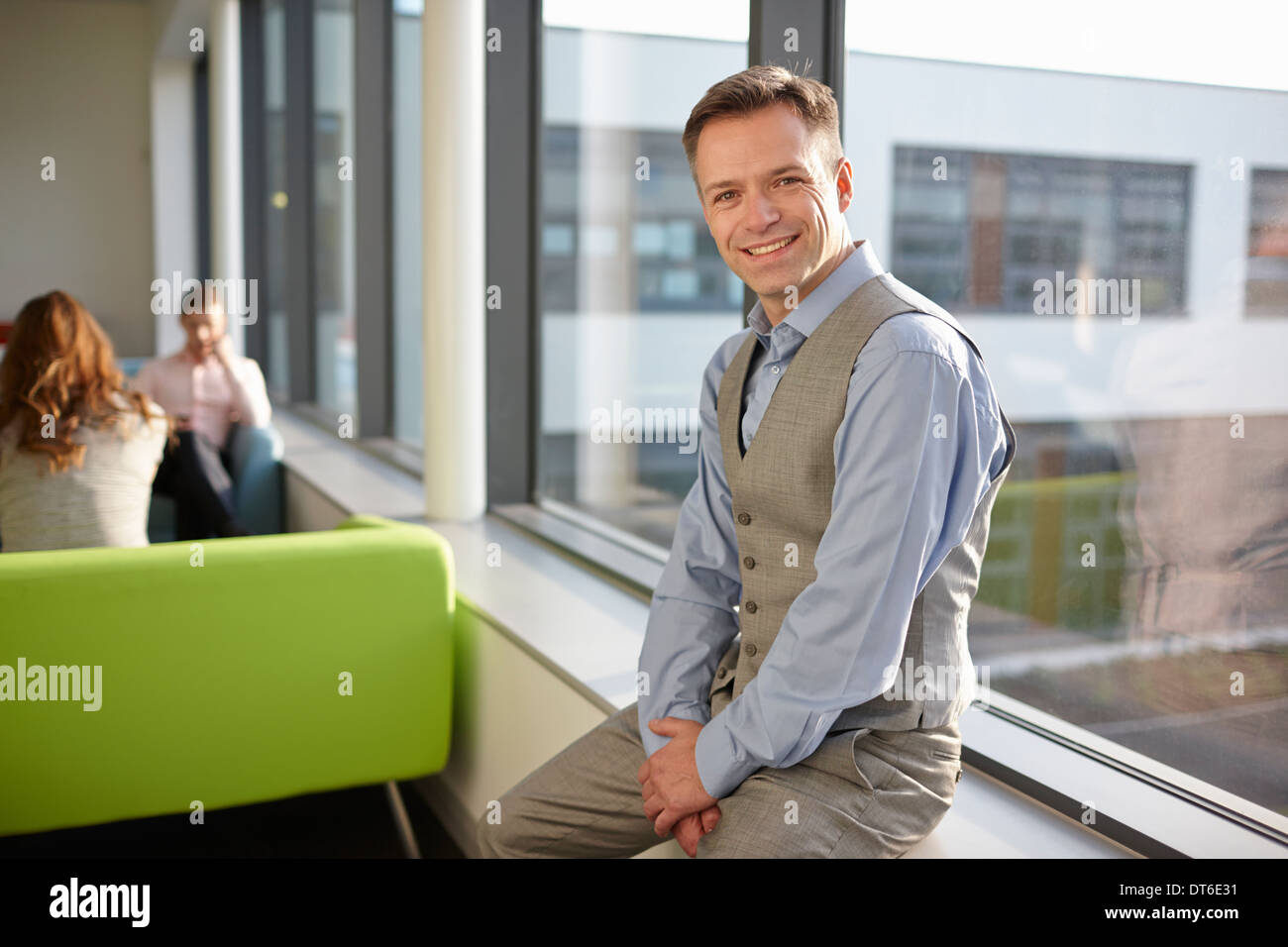 Portrait of mature man wearing waistcoat Stock Photo - Alamy