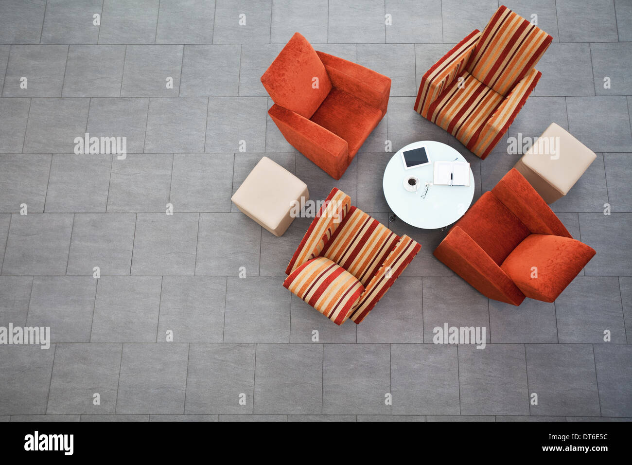 Overhead view of business armchairs in office atrium Stock Photo