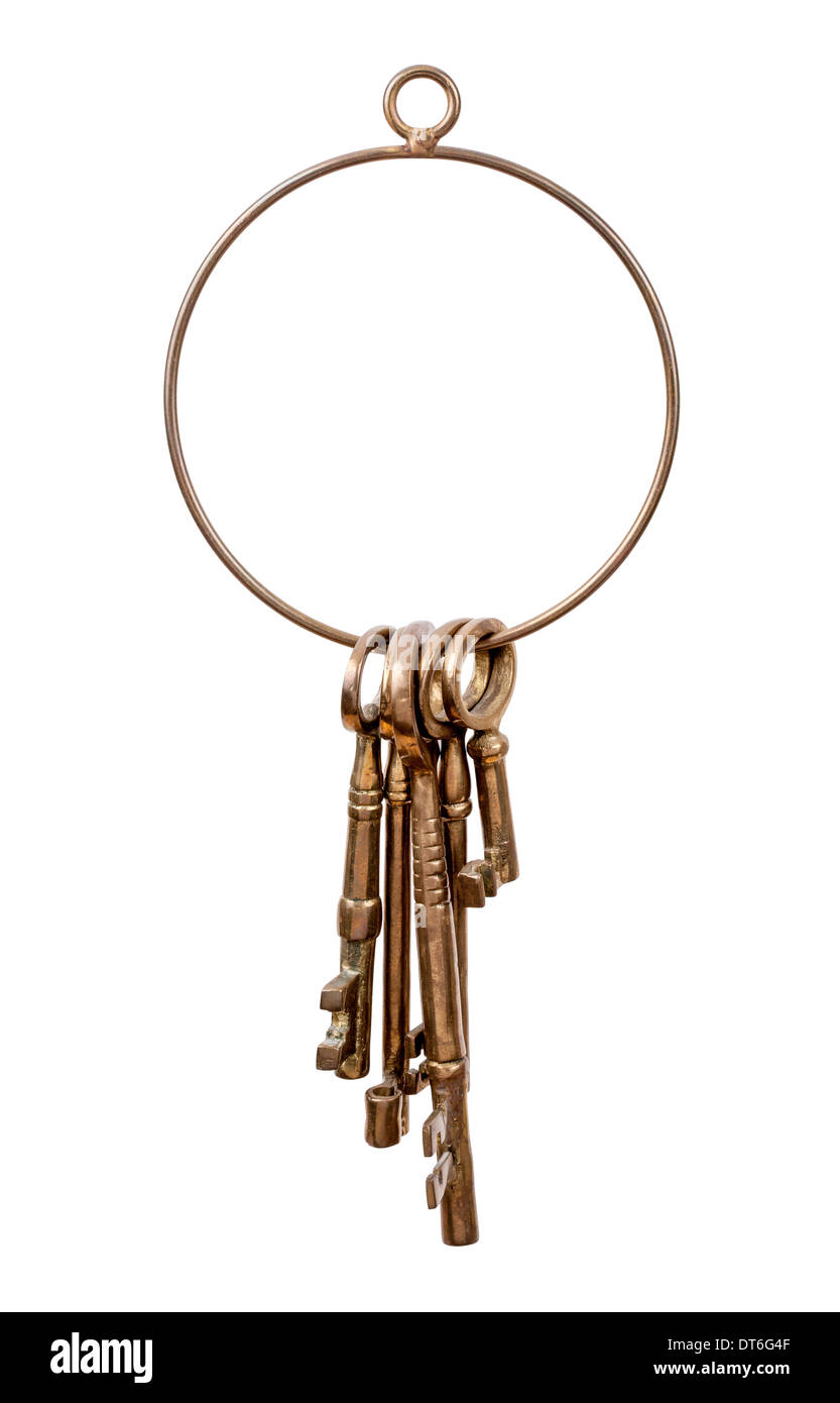 Brass Key Ring with assorted brass keys isolated on white Stock Photo
