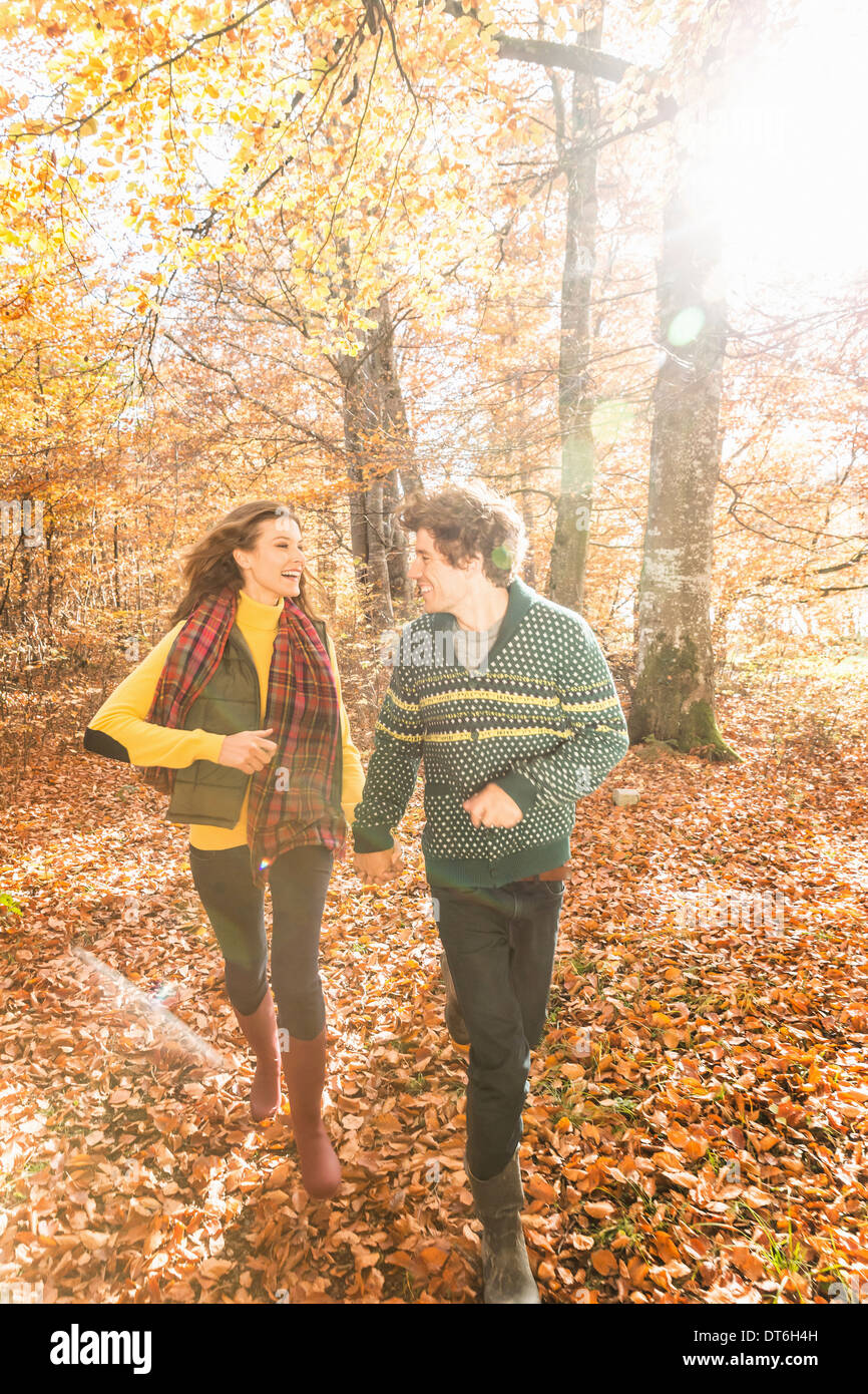 Couple holding hands in white hi-res stock photography and images - Alamy