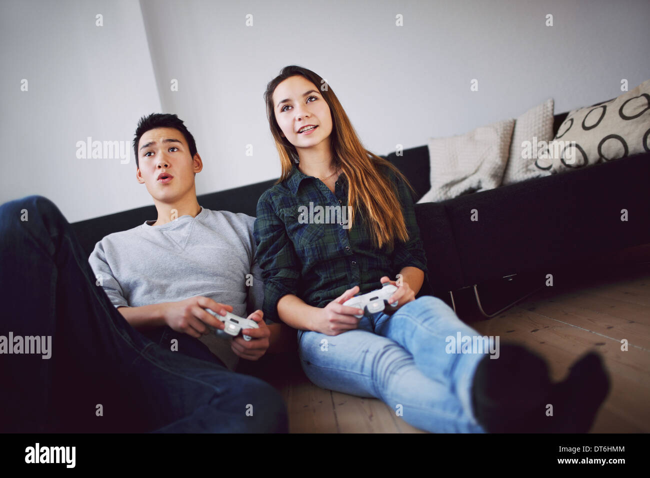 girl and boy playing video games