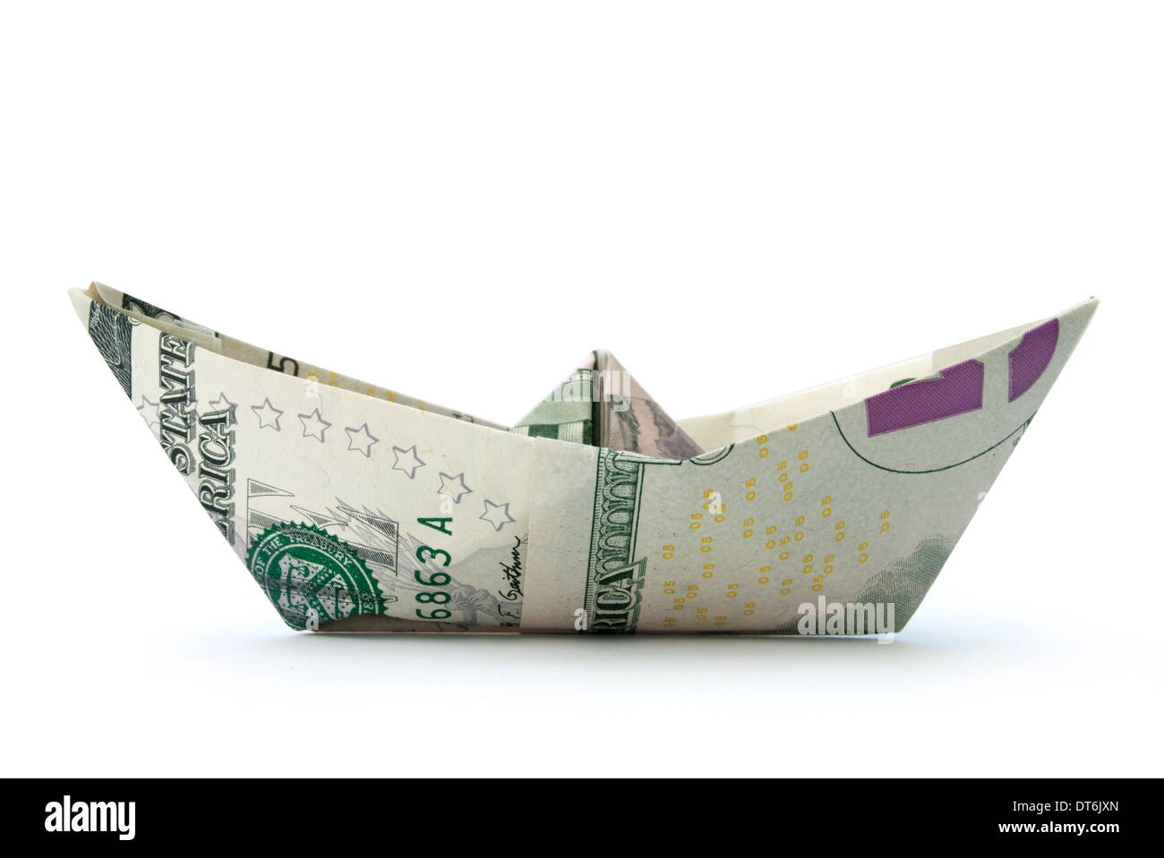 Dollar paper boat  isolated Stock Photo