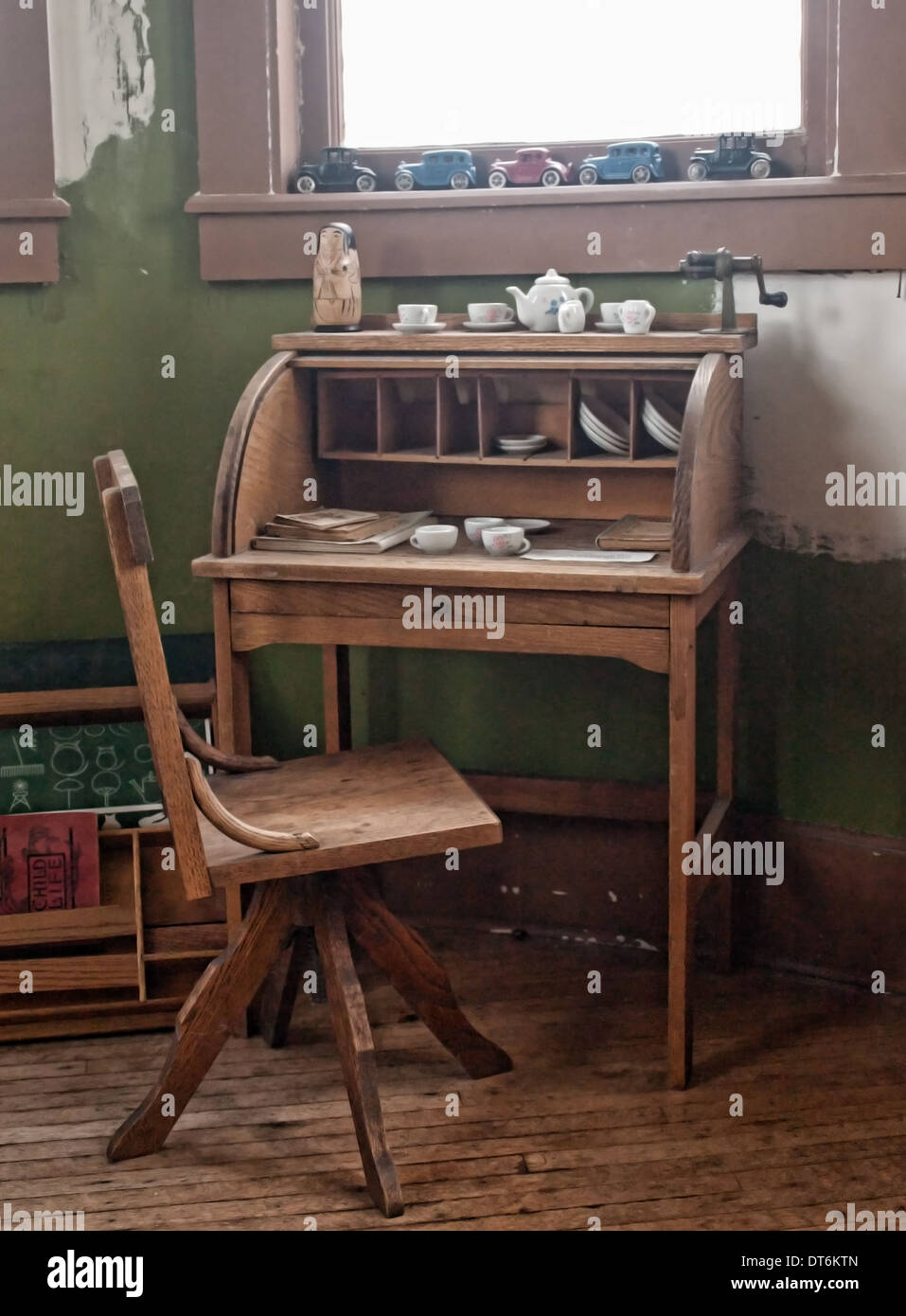 antique children's desk and toy room Stock Photo