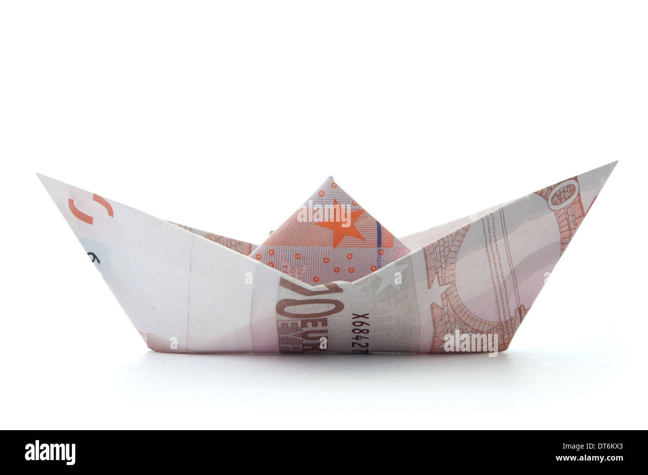 Euro banknote paper boat Stock Photo