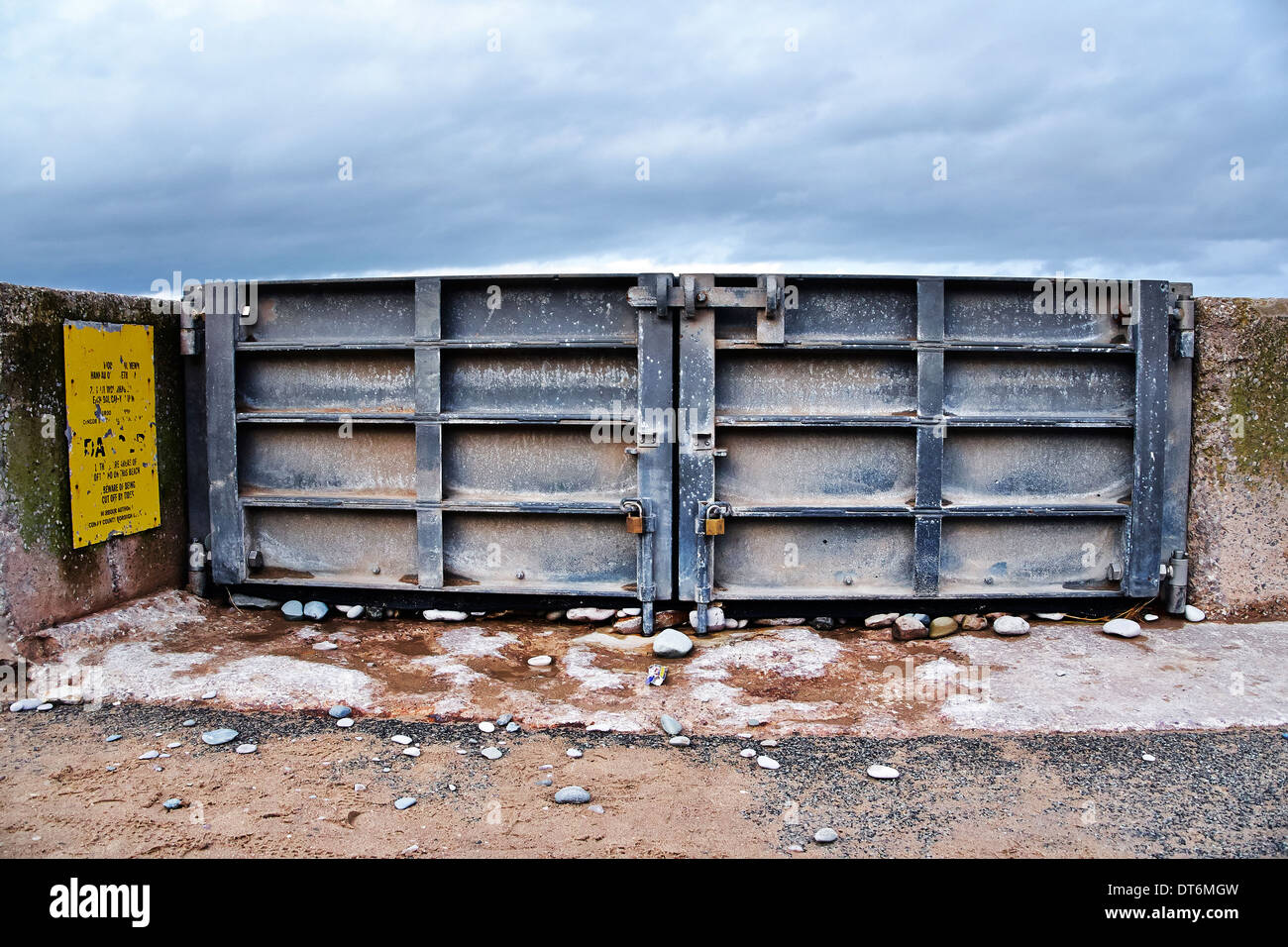 Flood Gates closed and locked against an incoming tide. Stock Photo