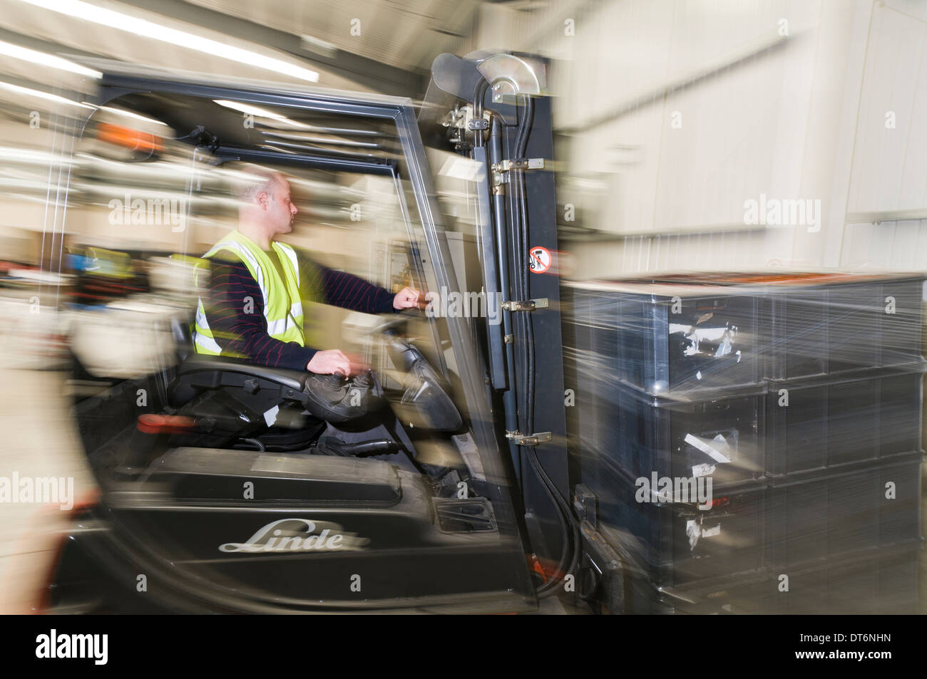 Man operating a forklift truck Stock Photo