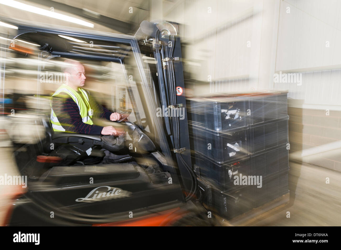 Man operating a forklift truck Stock Photo