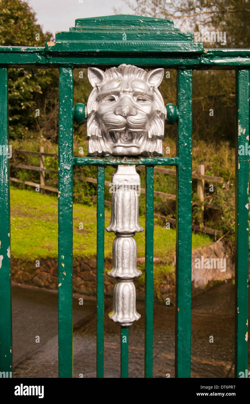 Foot bridge over rover / ford with ornate cast iron railing Stock Photo