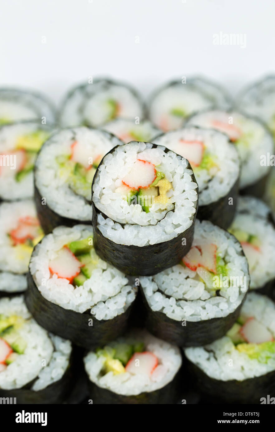 Vertical closeup photo of Single California hand roll sushi on top of ...