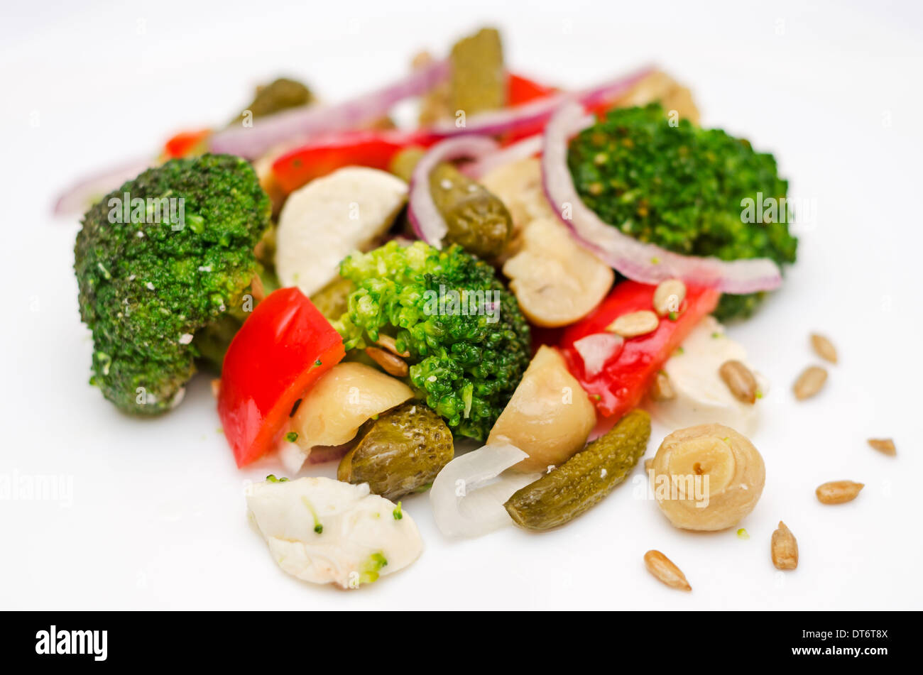 Broccoli salad with bell peppers, pickled cucumber, mushrooms and mozzarella Stock Photo Alamy