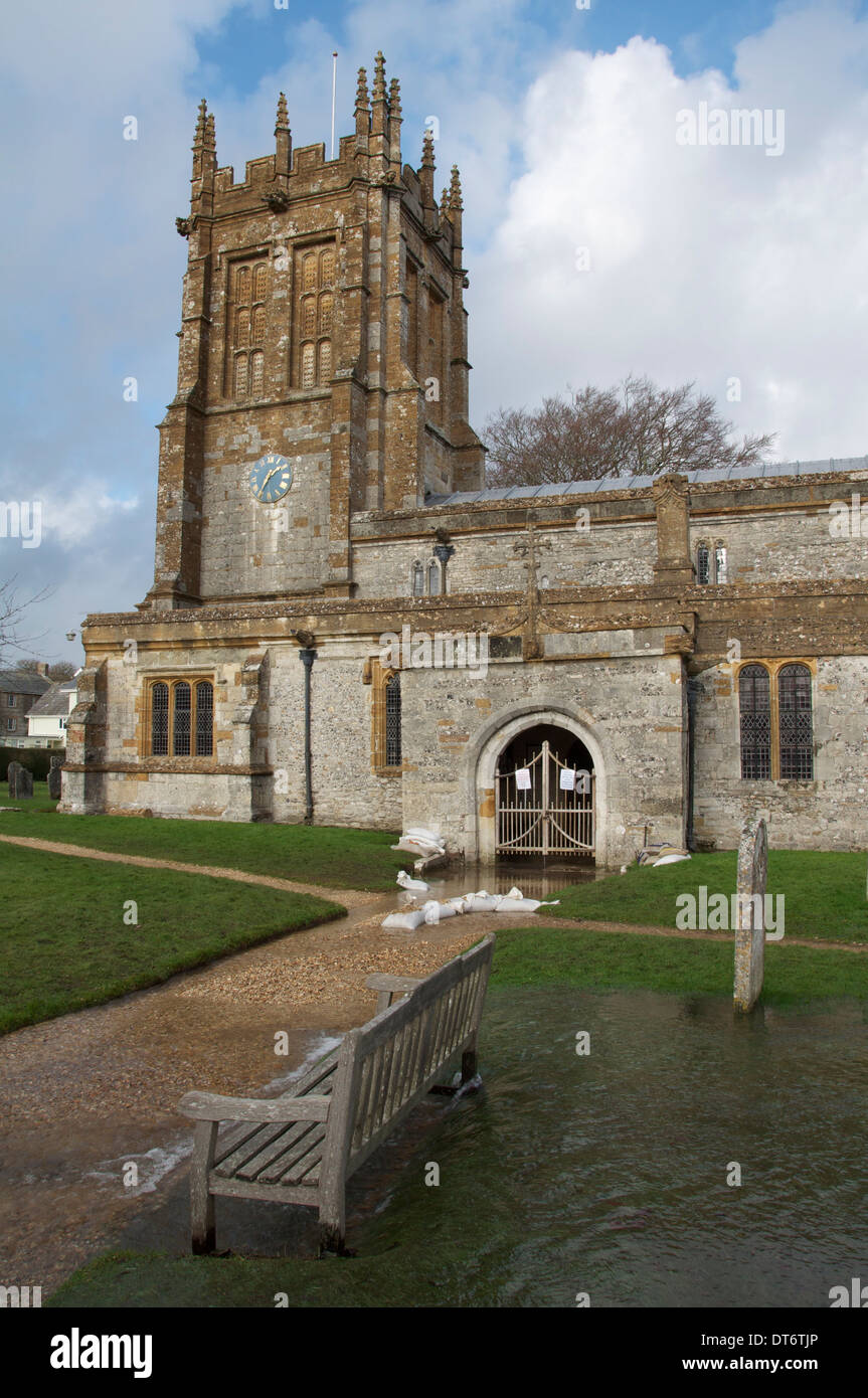 Flooding. The Church of St. Mary The Virgin, Charminster, flooded as