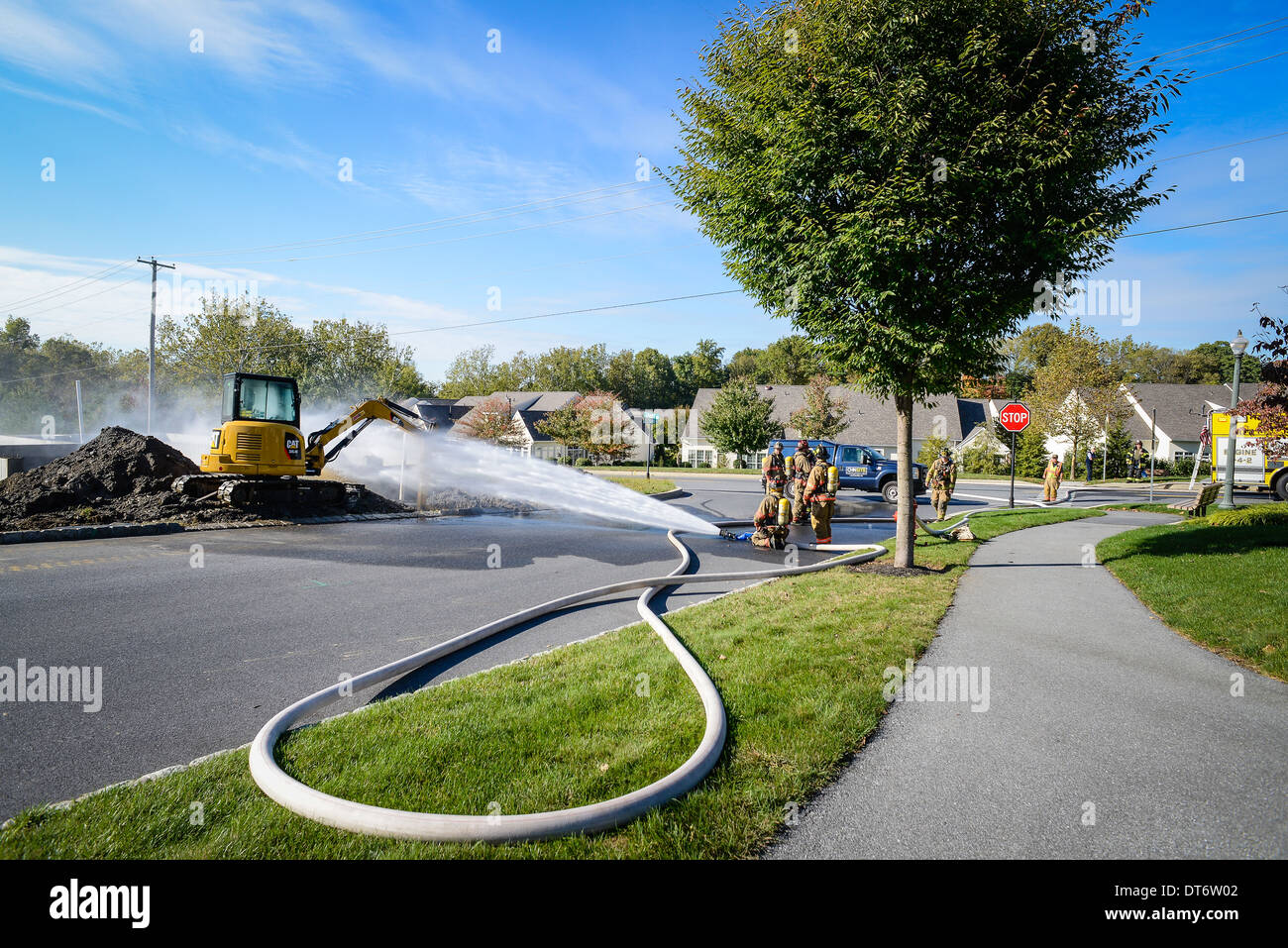 Group of volunteer firemen Stock Photo - Alamy