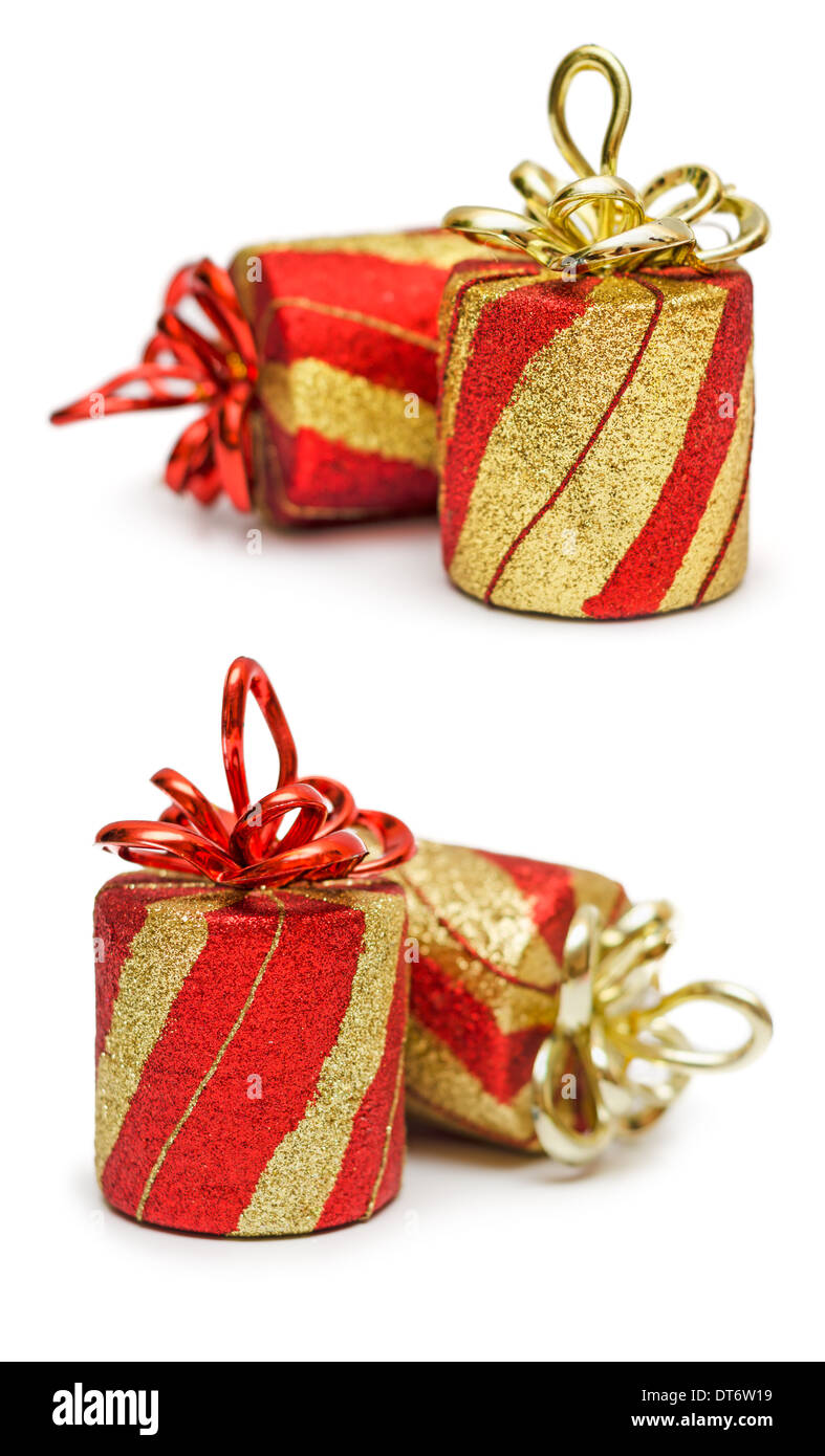 Red and golden gift boxes with ribbon and bow isolated on the white ...