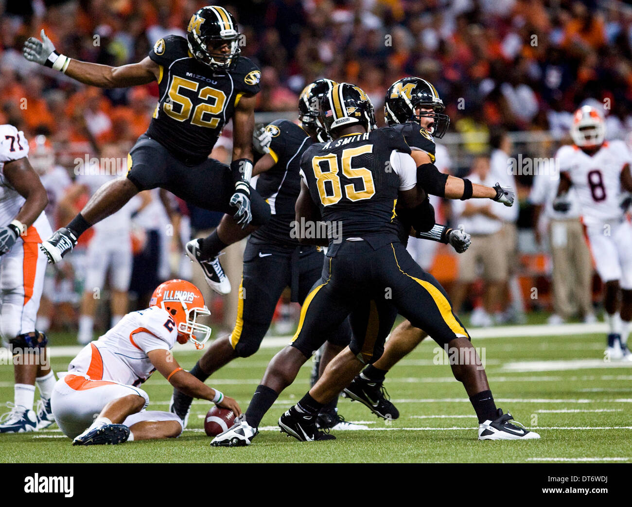 St. Louis, Missouri, USA. 10th Feb, 2014. Missouri Tigers defensive lineman Brad Madison (57), right, celebrates with teammate Aldon Smith (85), while defensive lineman Michael Sam (52) jumps into the air during the second half of the Arch Rivalry NCAA football game between the Mizzou Tigers and Fighting Illini at the Edward Jones Dome in St. Louis, Mo., Saturday, September 4, 2010. Missouri defeated Illinois 23-13 © csm/Alamy Live News Stock Photo