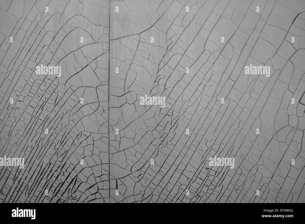 Cracked and weathered plastic window insulation film shrink abstract background. Stock Photo