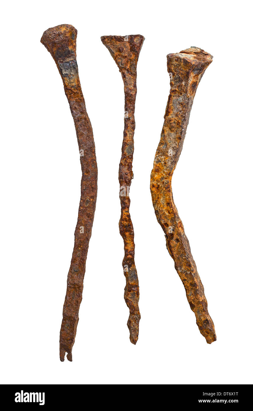 Old handforged rusty nails isolated on white background Stock Photo