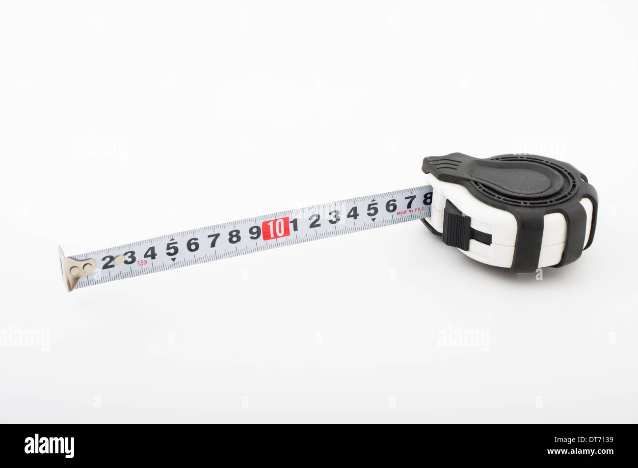 Selfretracting rollup tape measure ( metric ) a flexible ruler Stock