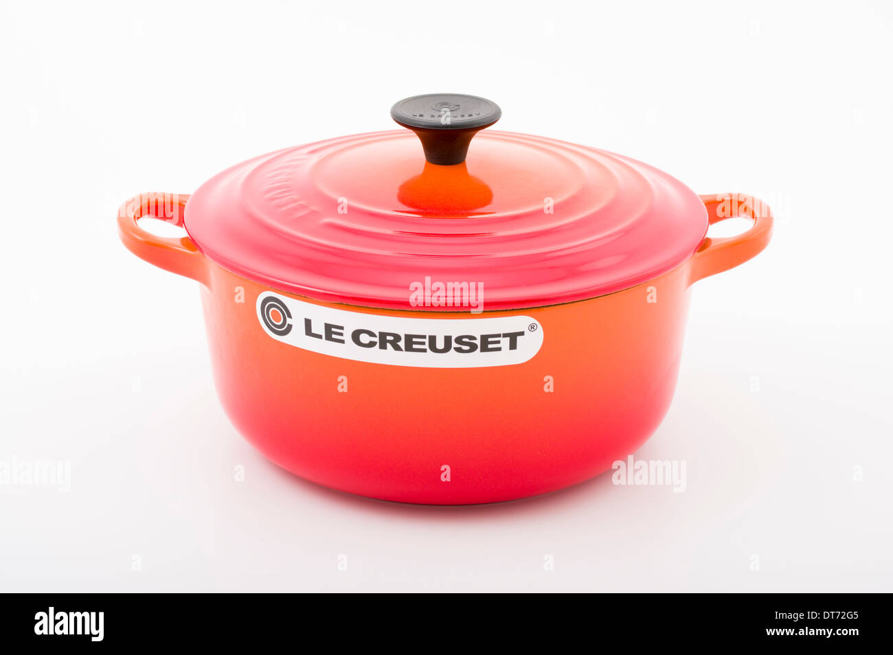 Le Creuset cast iron cast-iron French cookware with orange enamel. French oven / Casserole dish Stock Photo