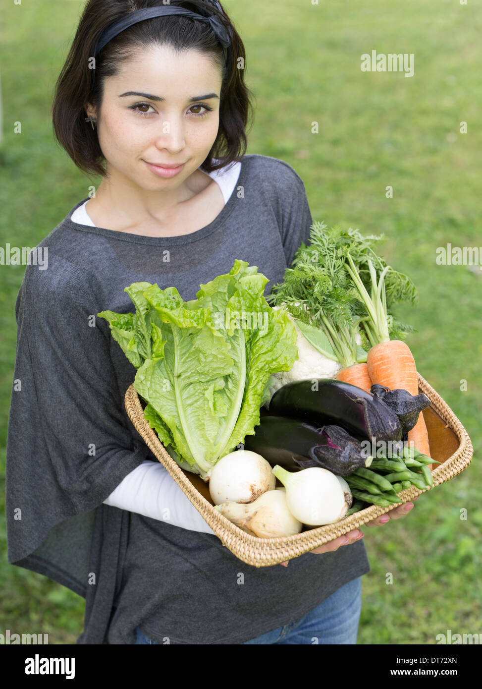 Young woman with fresh veggies Stock Photo