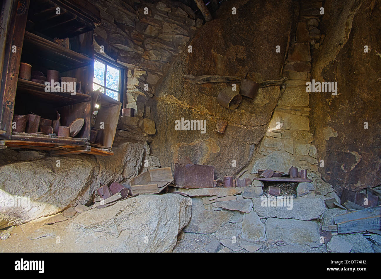 HDR image of a miner cabin built under rocks at the Eagle Cliff Mine in Joshua Tree National Park Stock Photo