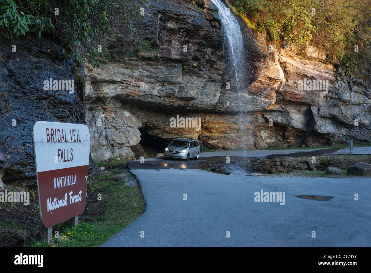 Bridal Veil Falls near Highlands, NC, provides an opportunity for drivers to drive behind a mountain waterfall along Highway 64. (USA) Stock Photo