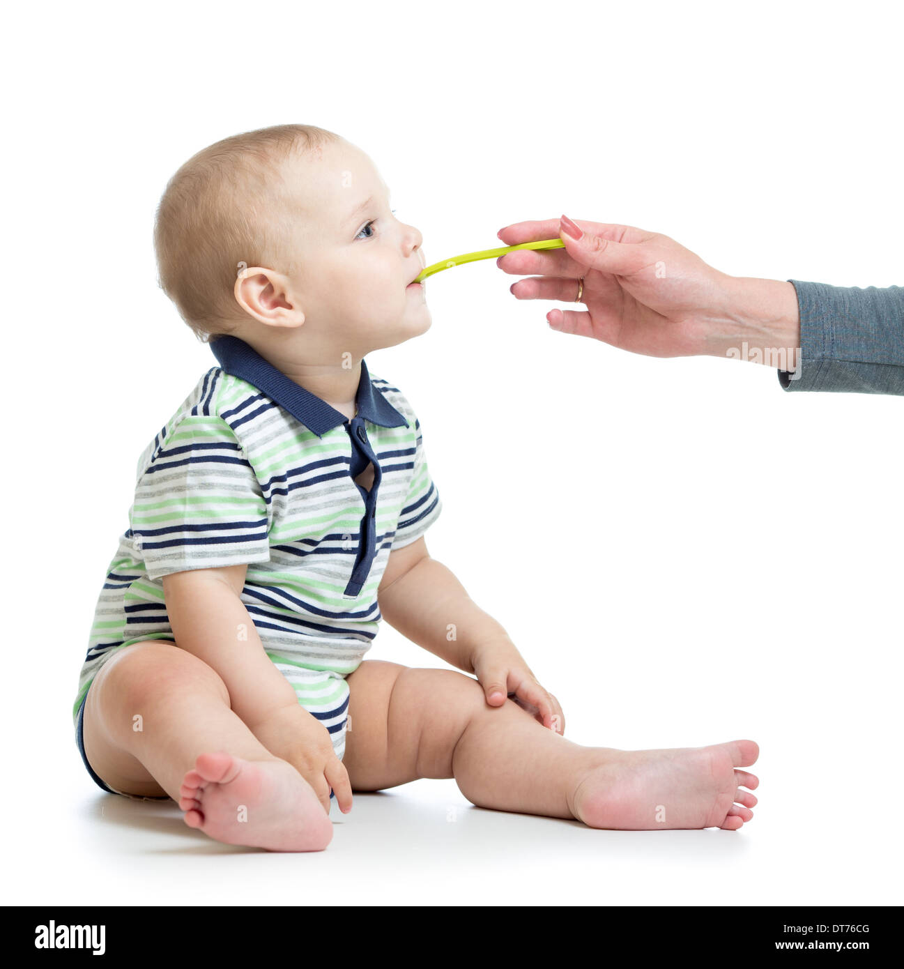 baby feeding with a spoon Stock Photo