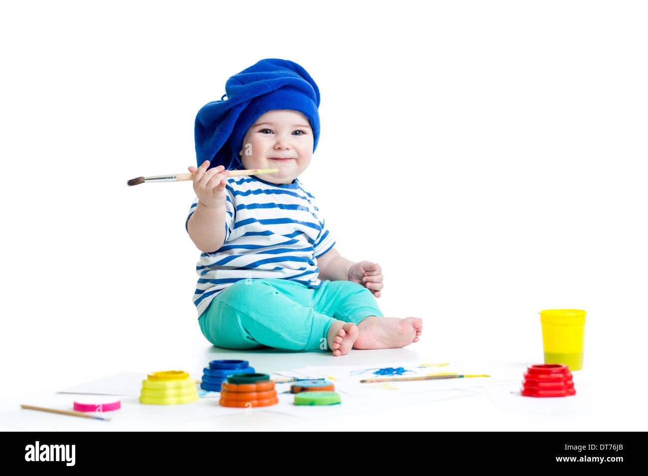 small artist baby with paints Stock Photo