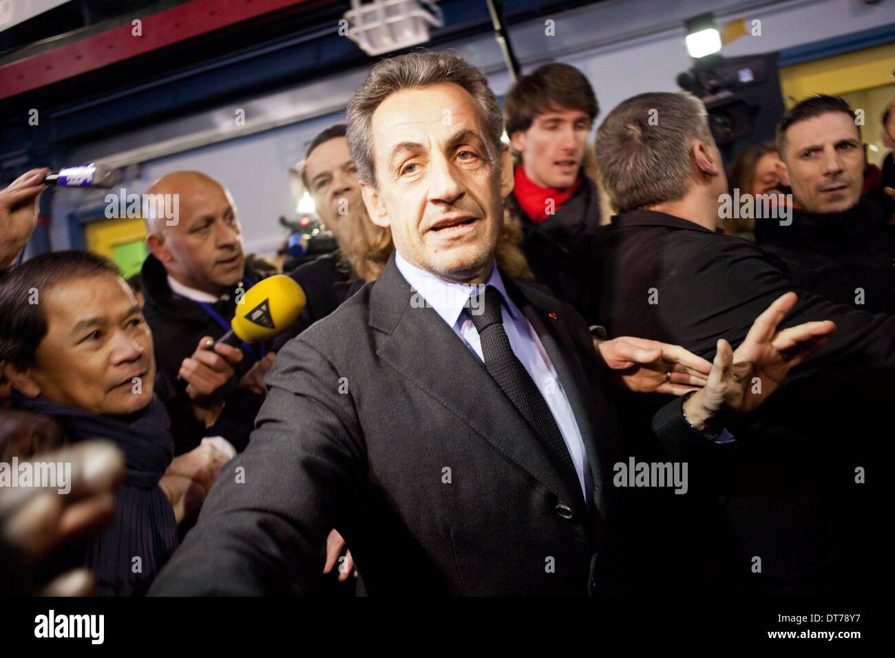 Paris, France. 10th Feb, 2014. Former French president Nicolas Sarkozy listens to a speech by French right-wing UMP party candidate for the March 2014 mayoral elections in Paris during a campaign meeting at the Gymnase Japy in Paris, on February 10, 2014. Credit:  Michael Bunel/NurPhoto/ZUMAPRESS.com/Alamy Live News Stock Photo