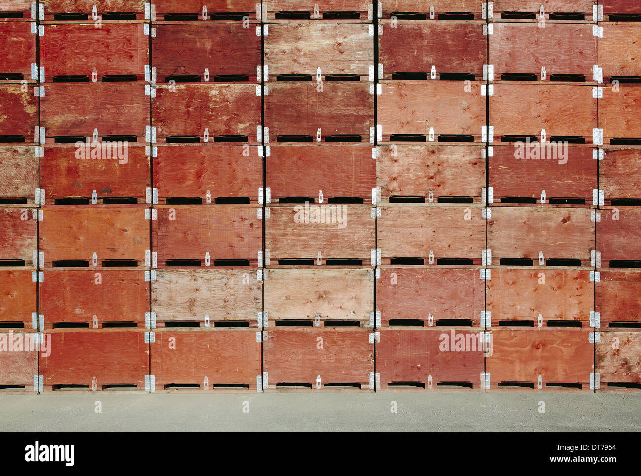 Large stack of fruit boxes for harvesting and storing apples, near