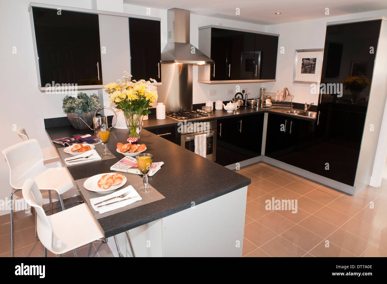 Modern black fitted kitchen Stock Photo