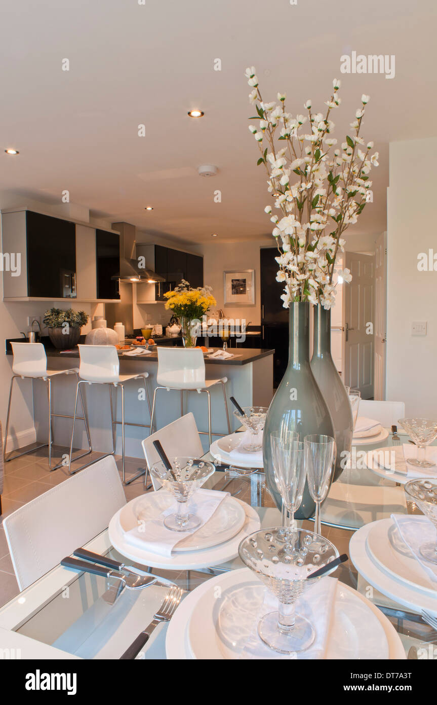 Show home kitchen / diner with sofa Stock Photo - Alamy