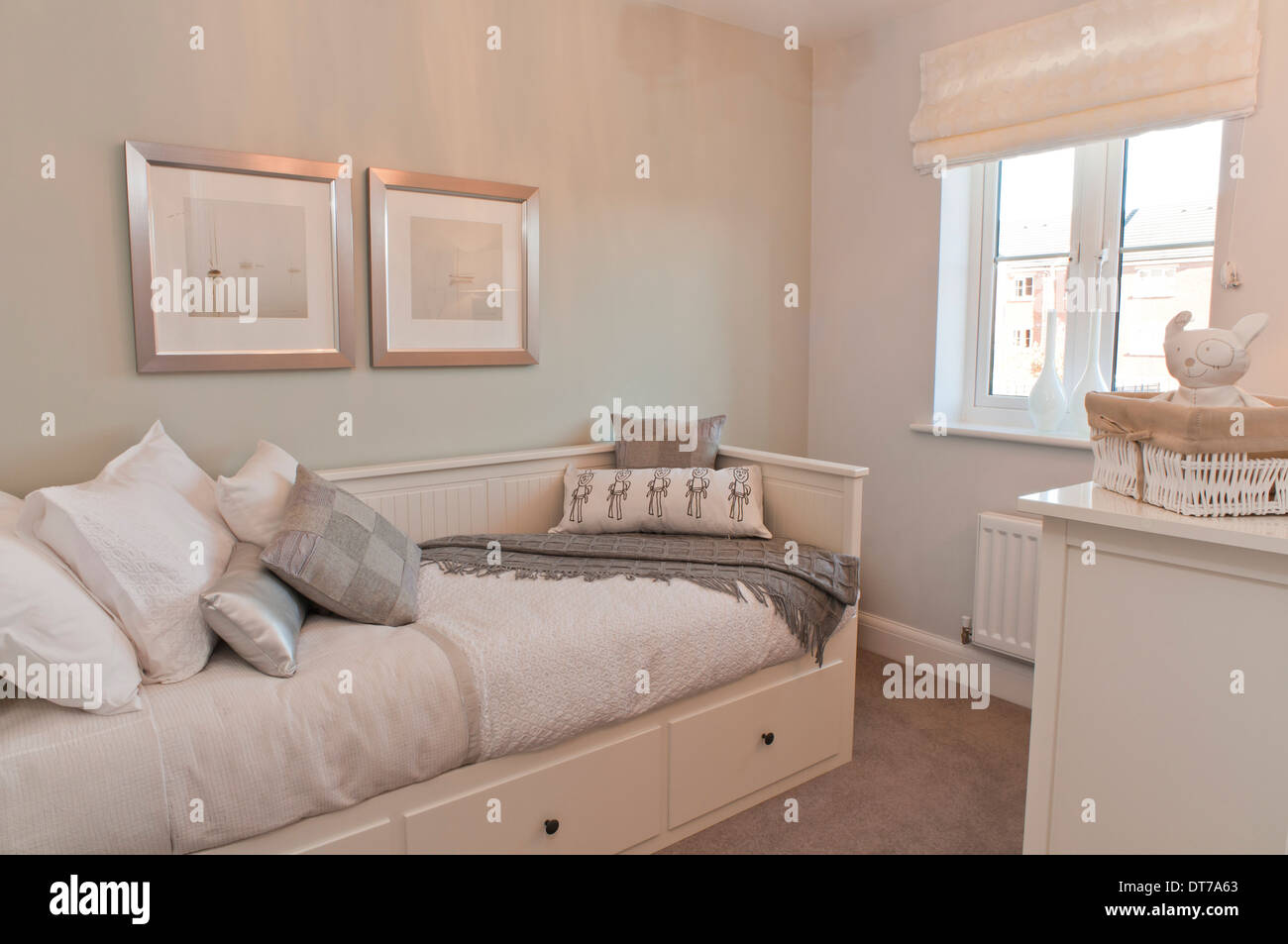 Spare room with sofa bed and neutral decoration Stock Photo - Alamy Spare room with sofa bed and neutral decoration Stock Photo - Alamy