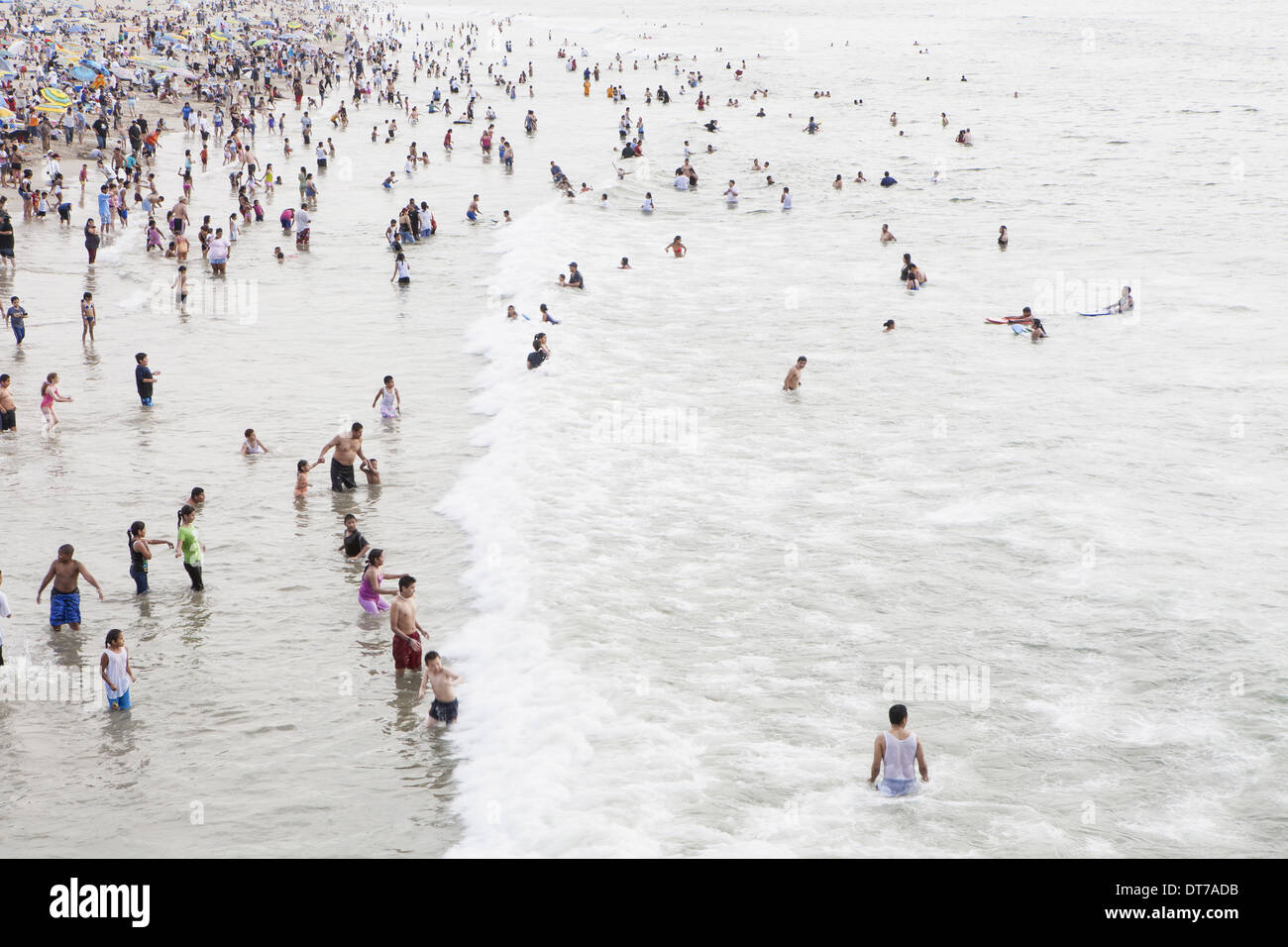 Large group of people swimming in the ocean at Santa Monica California Santa Monica Los Angeles County California USA Stock Photo