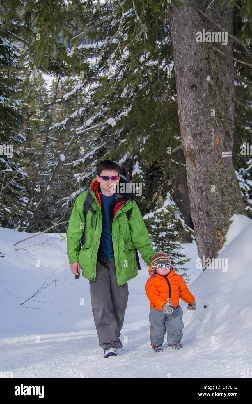 Father and son in the snow Stock Photo Alamy