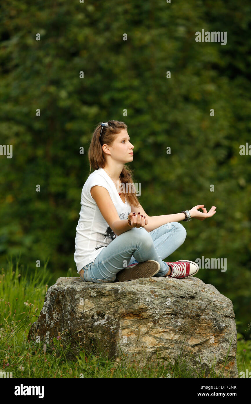 Young girl praying. Stock Photo