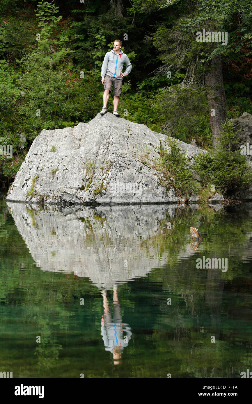 Man in front of a lake. Stock Photo
