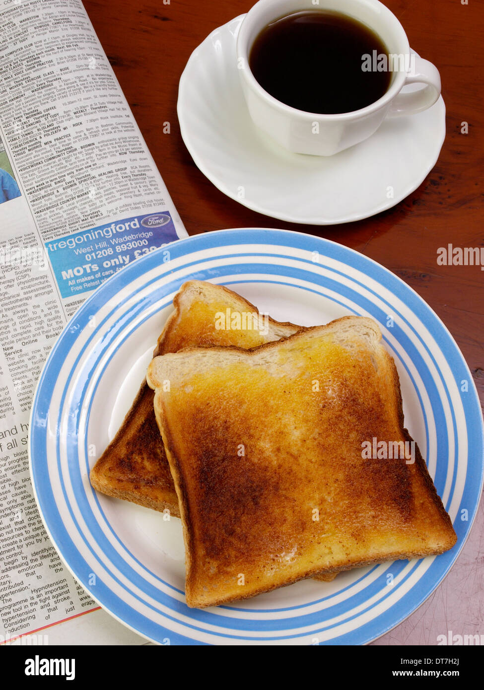 Breakfast with a newspaper Stock Photo Alamy